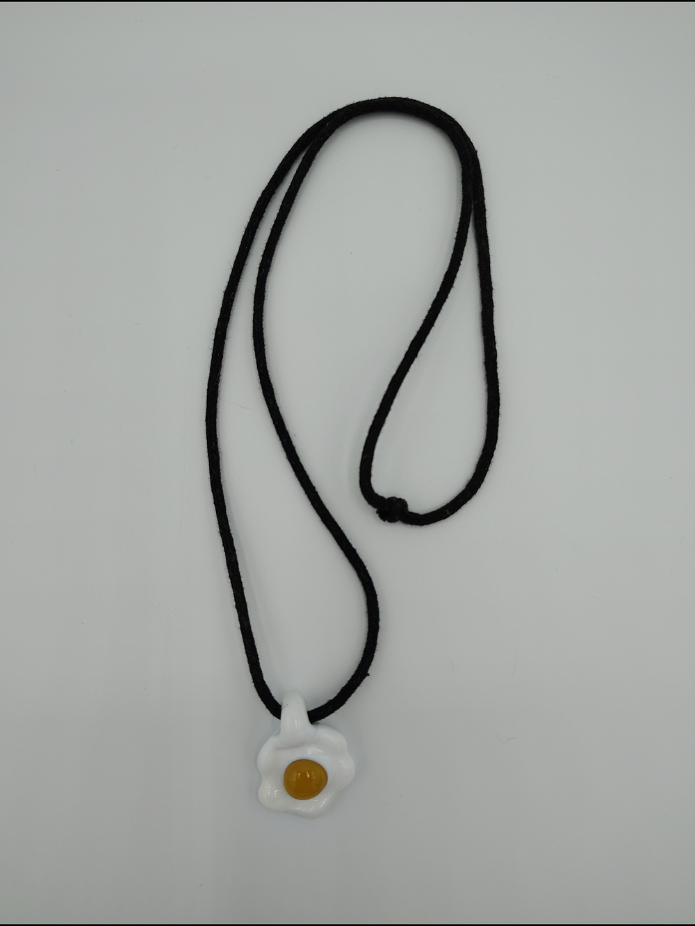 Ceramic Fried Egg Pendant Necklace – Black Cord 12"